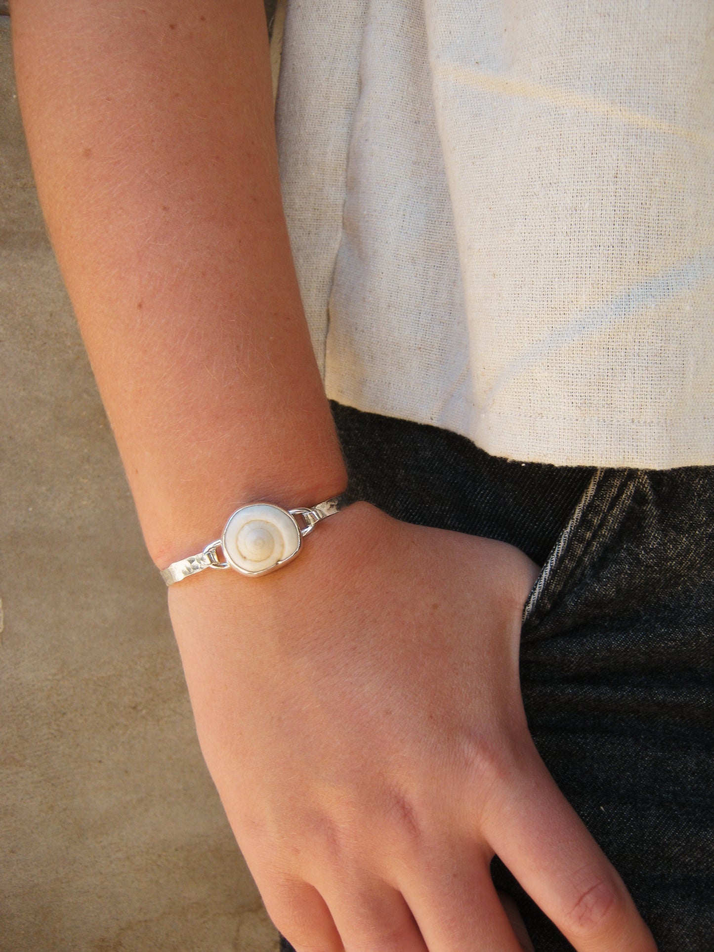 Tidal charm bracelet