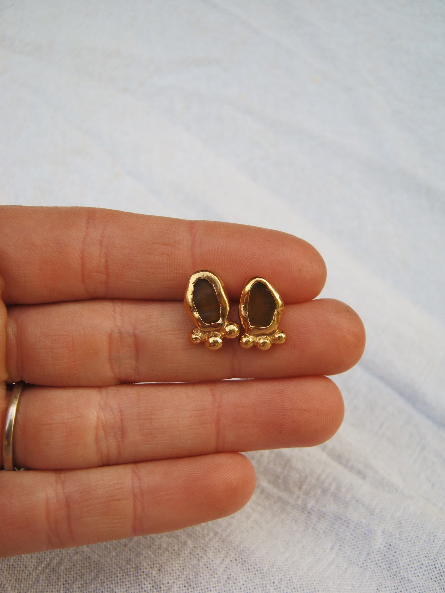 Umber dotty studs