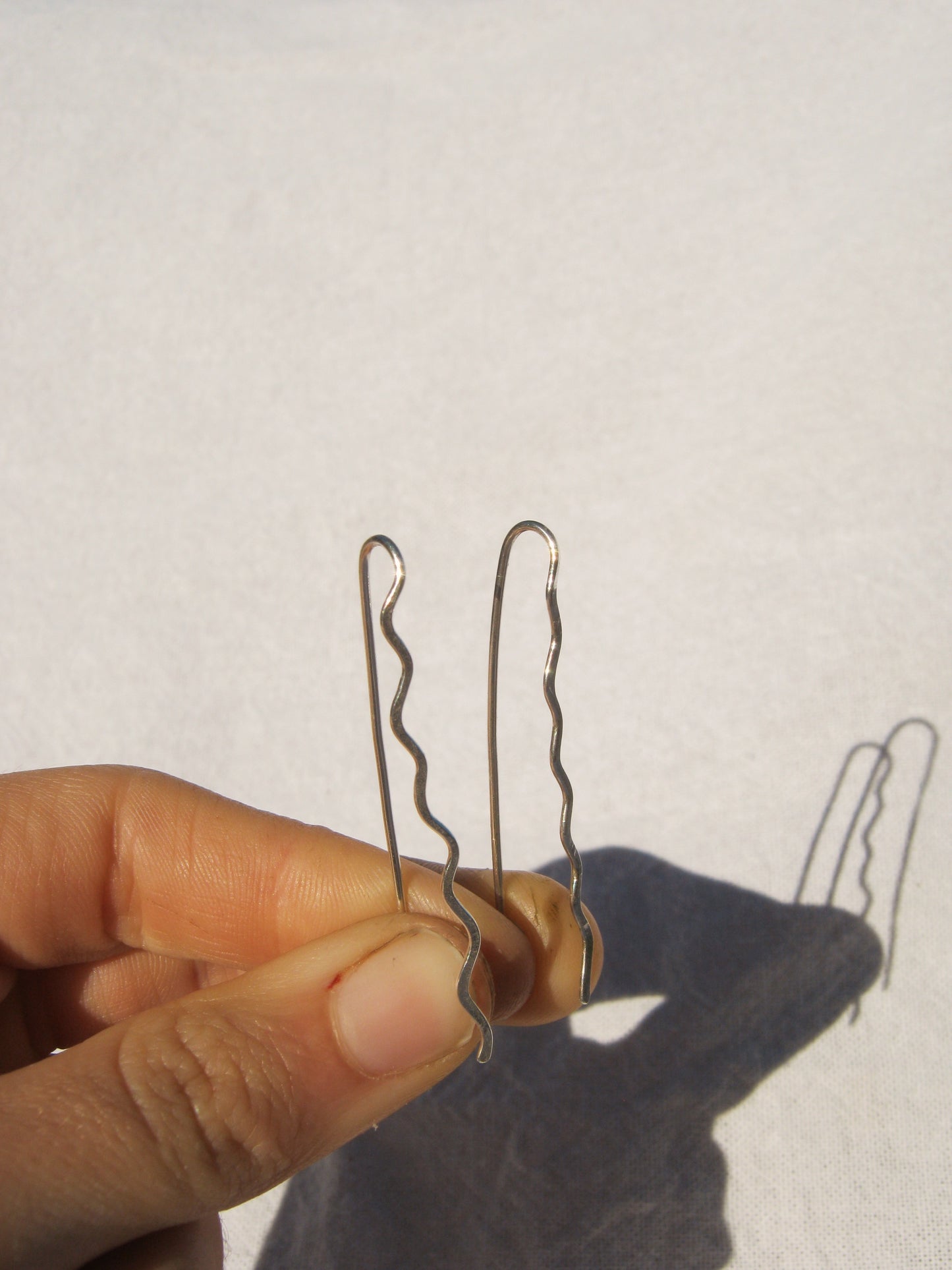 Squiggle ear pin