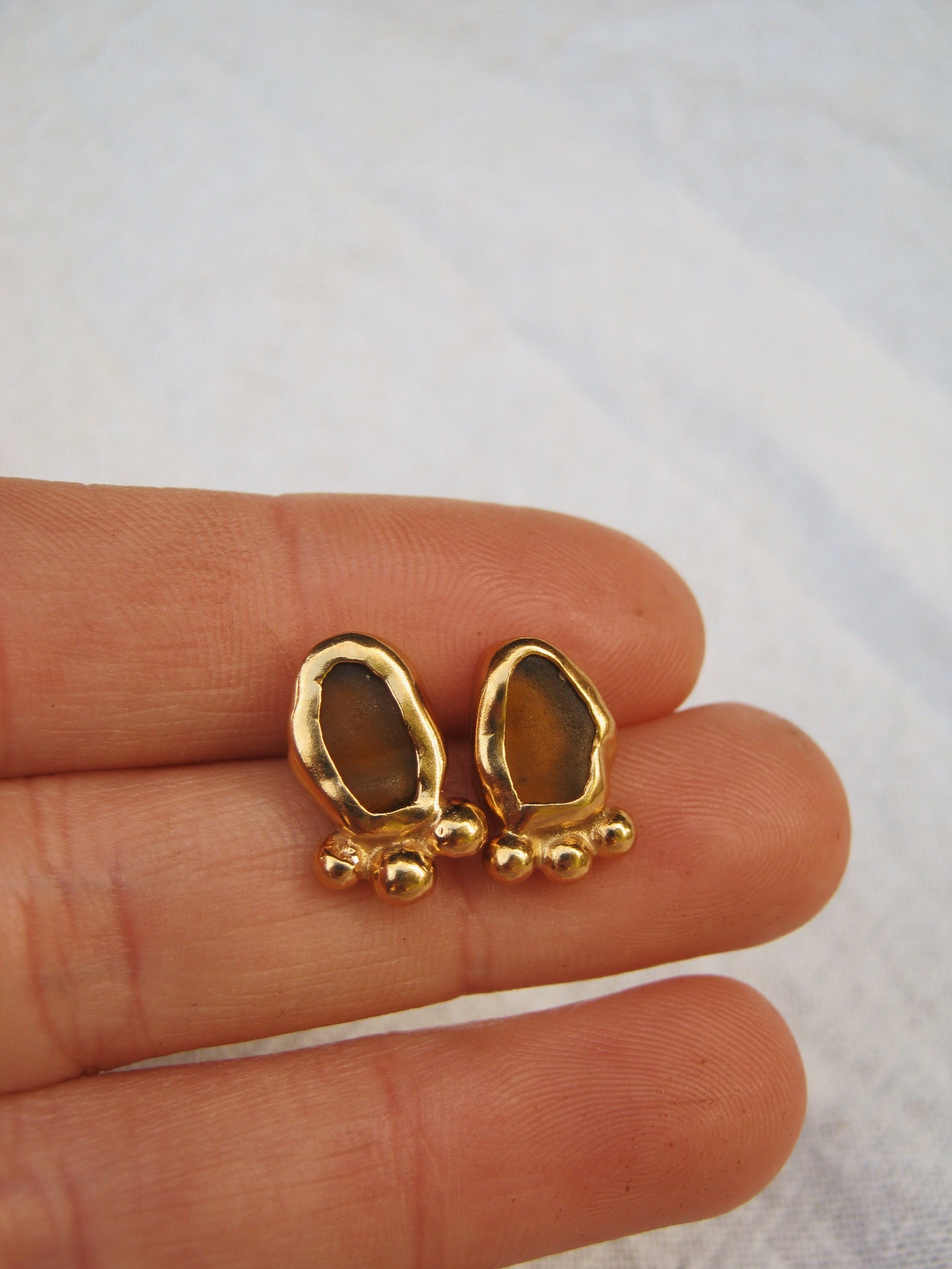 Umber dotty studs