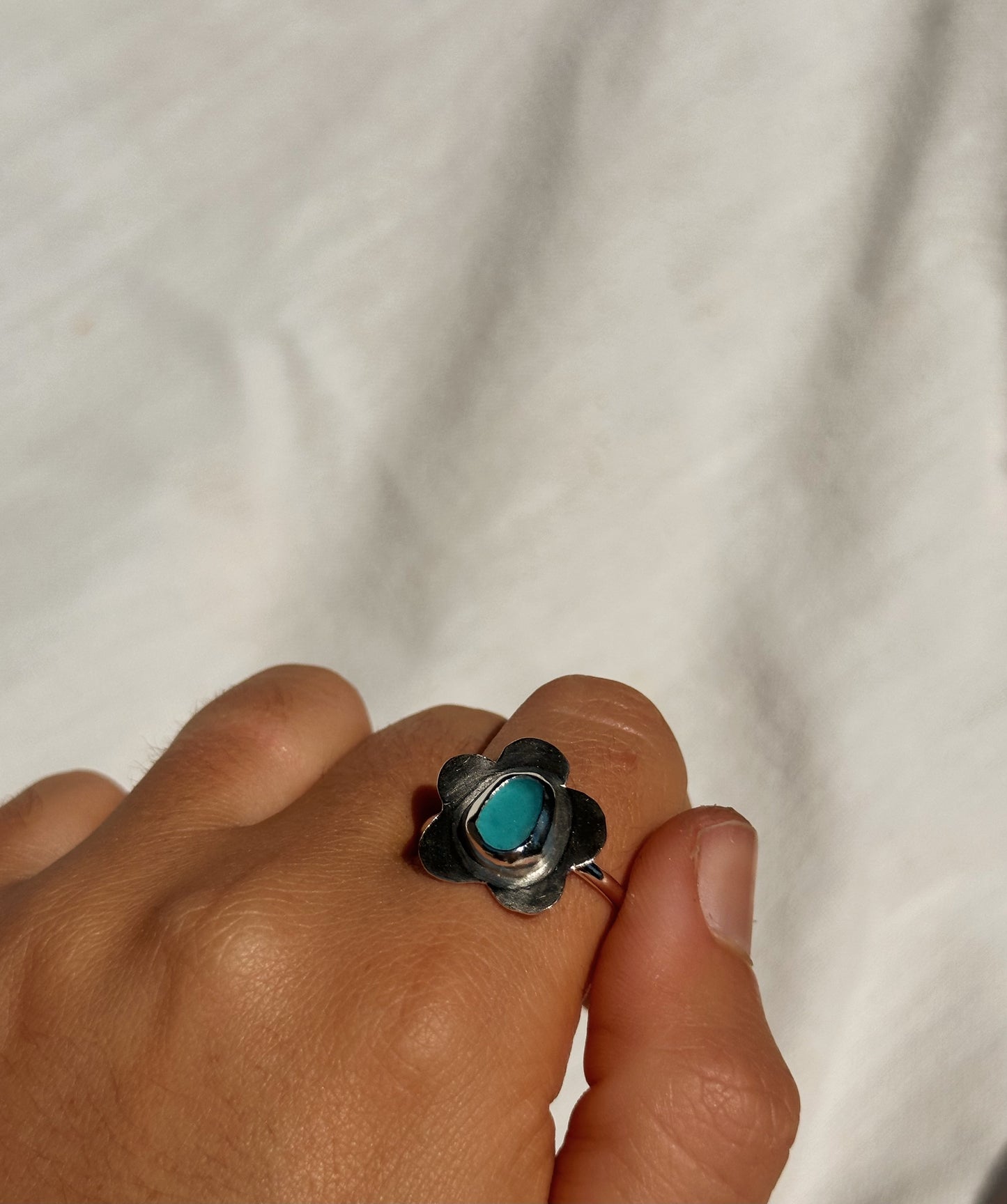 Delphinium ring