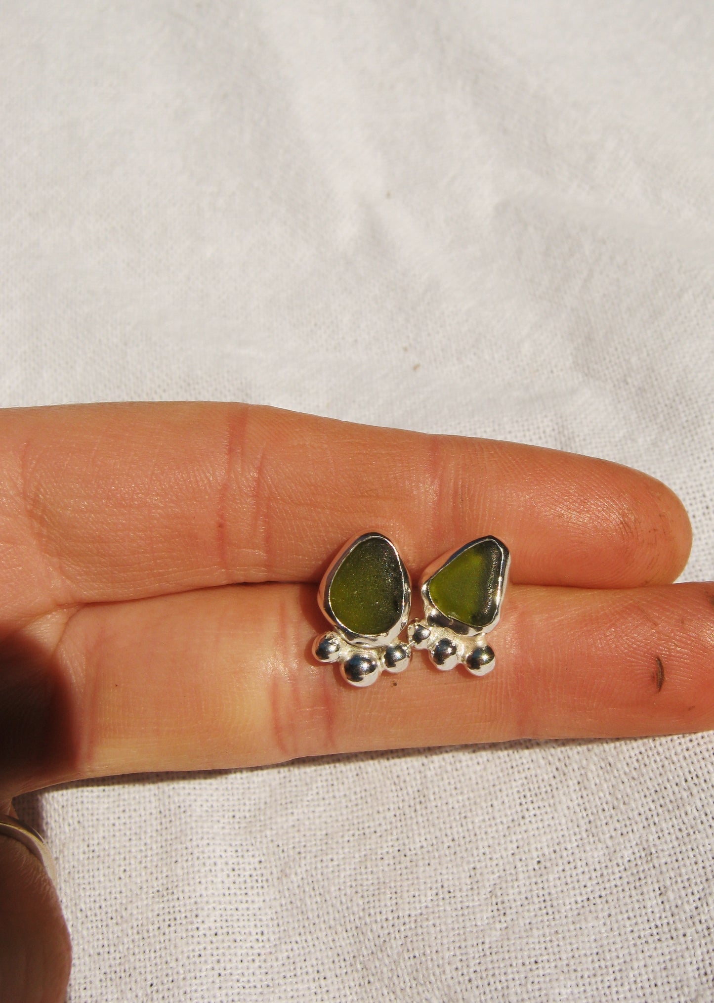 Olive dotty studs