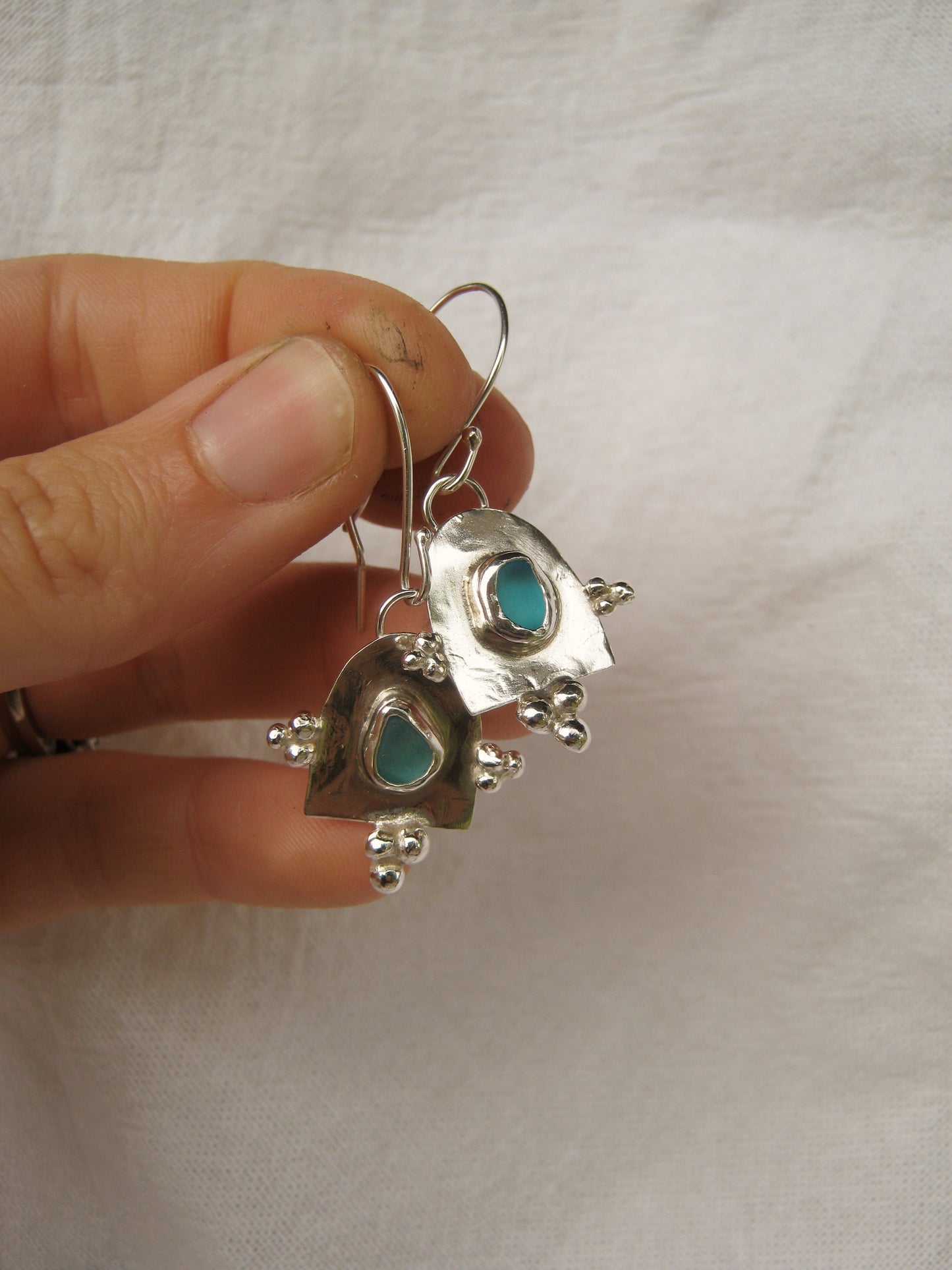 Oceania arch earring